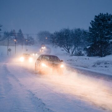 Blizzard on the Road during a Cold Winter Evening in Canada