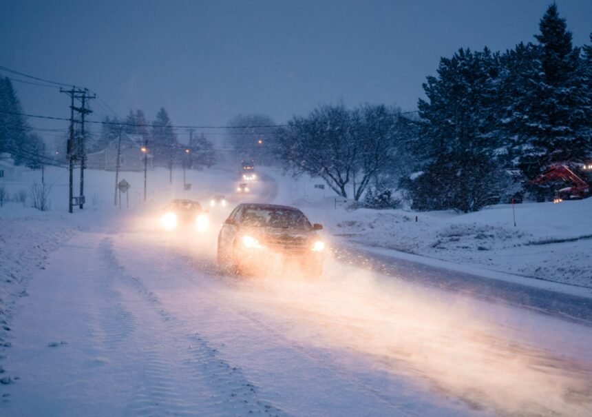 Blizzard on the Road during a Cold Winter Evening in Canada