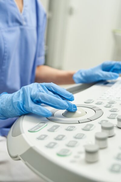 Gynecologist performing diagnostics in modern healthcare clinic setting